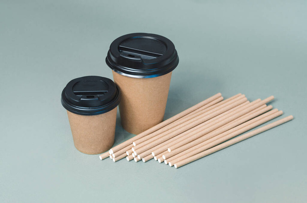Paper coffee cups with paper straw. Eco friendly design. Zero waste - Photo, Image