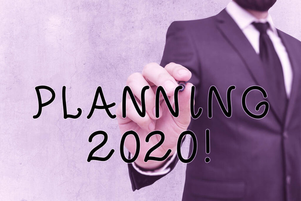 Writing note showing Planning 2020. Business photo showcasing process of making plans for something next year. - Photo, Image