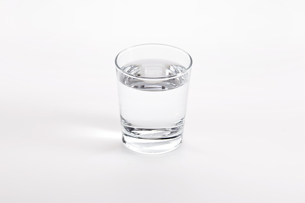Glass with water on white background - Photo, image