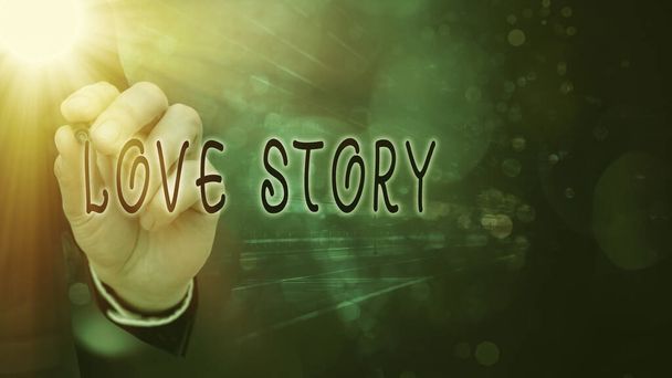 Conceptueel handschrift met Love Story. Zakelijke foto presentatie het is iets zoals een roman of film over een liefdesrelatie. - Foto, afbeelding