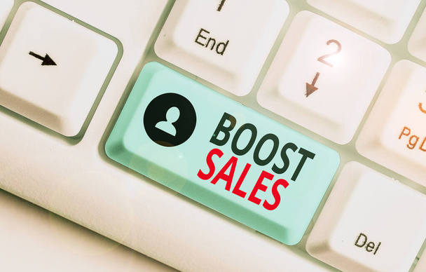 Kézírás szöveg Boost Sales. A koncepció azt jelenti, hogy az értékesítési nyereséget alacsonyabb helyről magasabb helyre vagy pozícióba kell áthelyezni.. - Fotó, kép