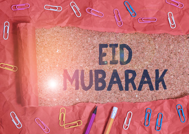 Testo scritto a mano Eid Mubarak. Concetto che significa tradizionale saluto musulmano riservato alle feste sacre
. - Foto, immagini