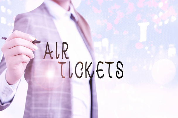 Conceptual hand writing showing Air Tickets. Business photo showcasing individual is entitled to a seat on a flight on an aircraft. - Photo, Image