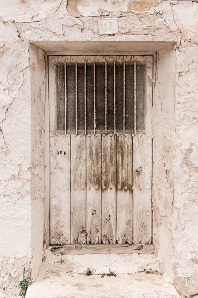 White wooden rural door with bars closed - Photo, Image