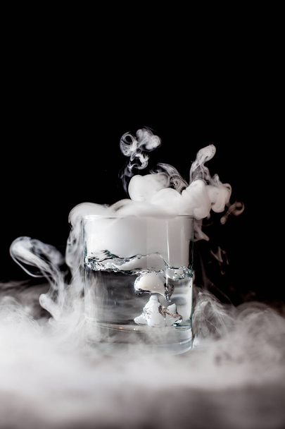 Chemical reaction of dry ice with liquid - Photo, Image