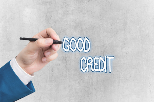 Kelime yazma metni İyi Kredi. Borçluların iş konsepti nispeten yüksek kredi puanı ve güvenli kredi riskine sahiptir. - Fotoğraf, Görsel