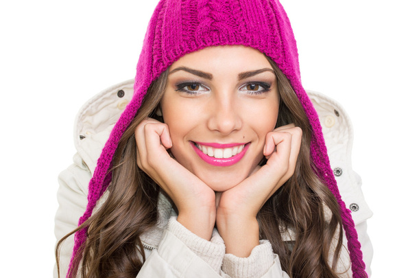 Beautiful teenage girl wearing pink winter knit beanie - Фото, изображение