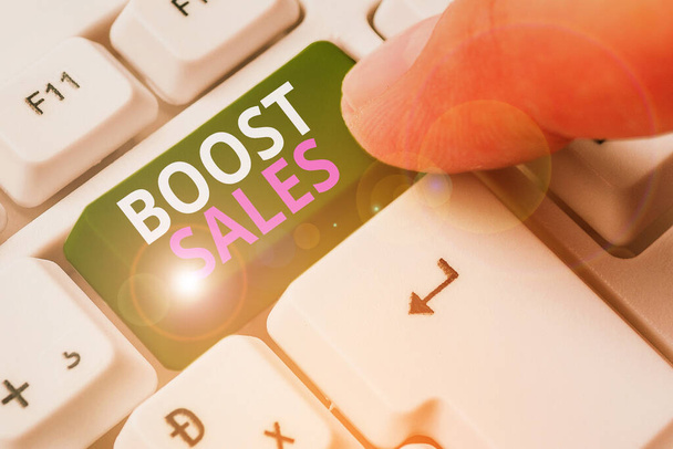 Slovo psaní textu Boost Sales. Obchodní koncept pro přesun zisku z prodeje z nižšího na vyšší místo nebo pozici. - Fotografie, Obrázek