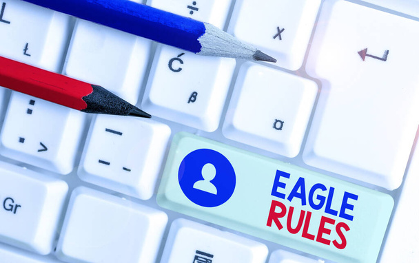 Handwriting text Eagle Rules. Concept meaning a huge set of design rules which your layout needs to pass. - Photo, Image