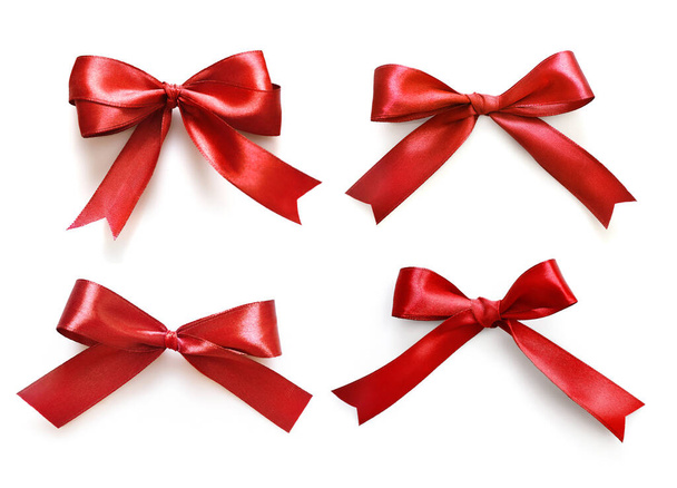 Set of shiny red satin bows isolated on white background - Photo, Image