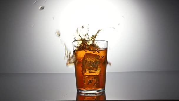 ice cube falling into a glass - Footage, Video
