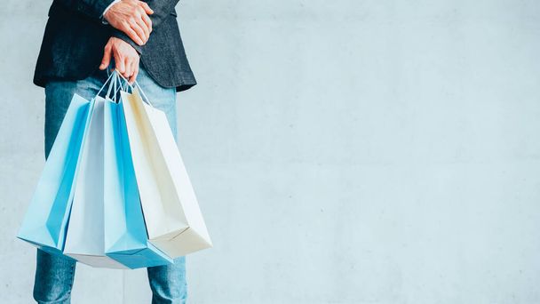 shopaholic lifestyle season discount sale man bags - Zdjęcie, obraz