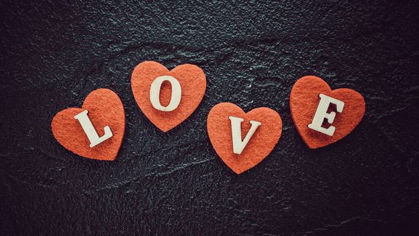 red hearts on black. concept of valentine day, love, wedding.  - Fotoğraf, Görsel