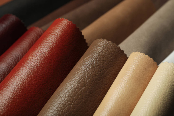 Different leather samples as background, closeup view - Foto, afbeelding