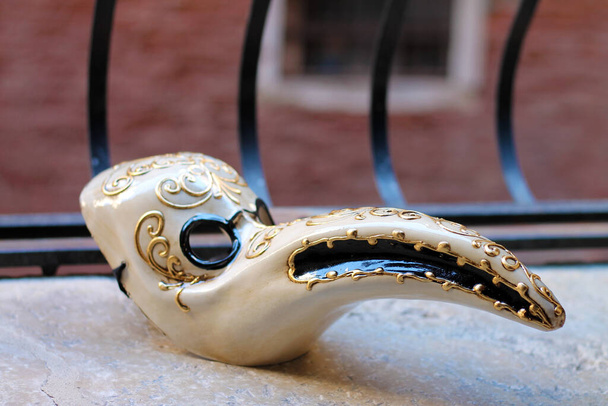A Venetian handmade plague doctor mask close up. - Photo, Image