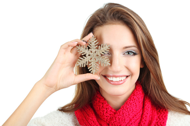 Beautiful smiling girl with Christmas snowflake isolated on white - Fotó, kép