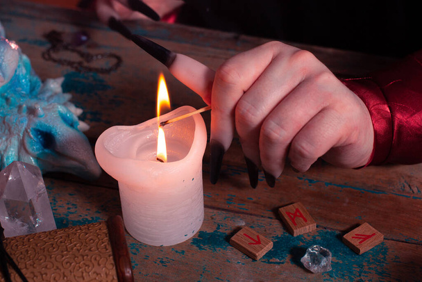Fortune telling with runes by the witch - Photo, Image