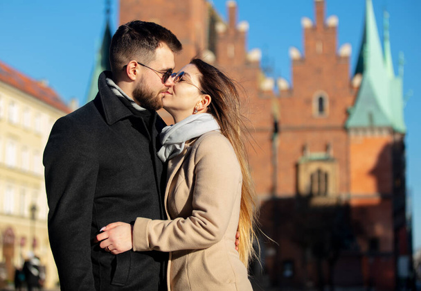 young couple kissing  on a city street in Wroclaw, Poland - Φωτογραφία, εικόνα