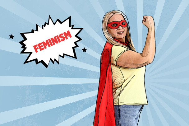 Vrouw in superheld kostuum op blauwe achtergrond. Begrip feminisme - Foto, afbeelding