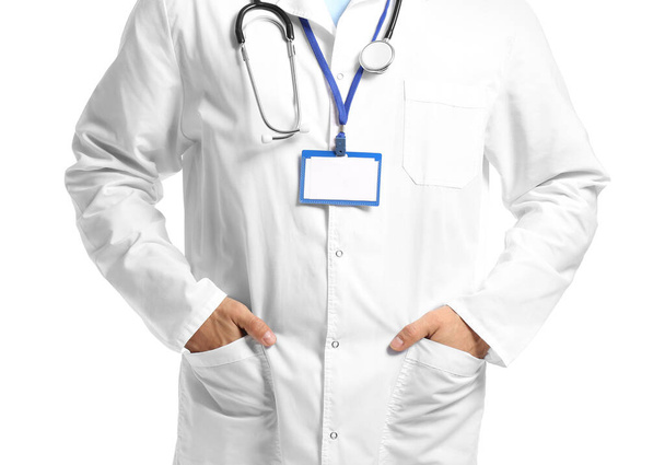 Jovem médico do sexo masculino em fundo branco
 - Foto, Imagem