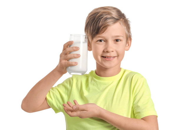 Little boy with milk on white background - Photo, Image