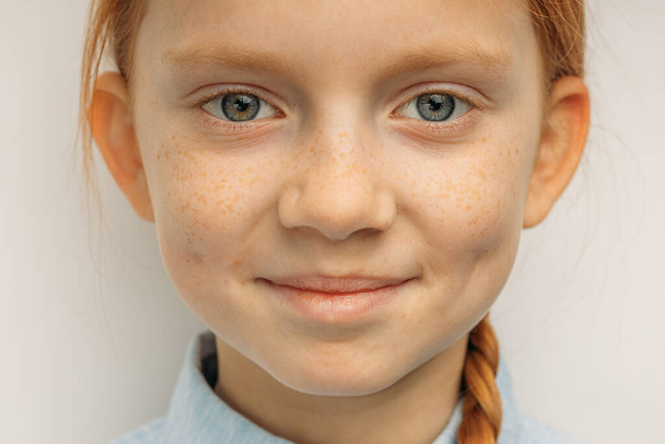close-up portrait of smiling child girl with red hair - Foto, Imagem