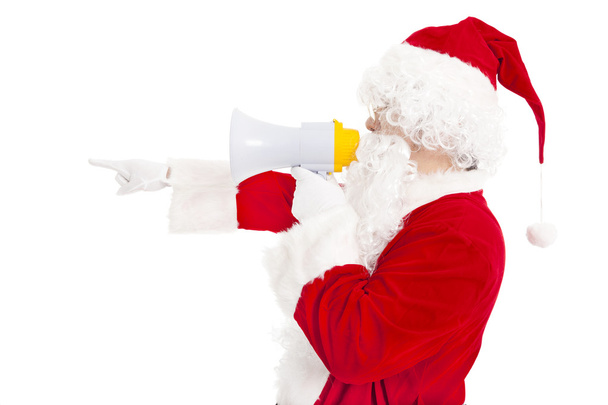 Santa Claus holding megaphone with pointing - 写真・画像