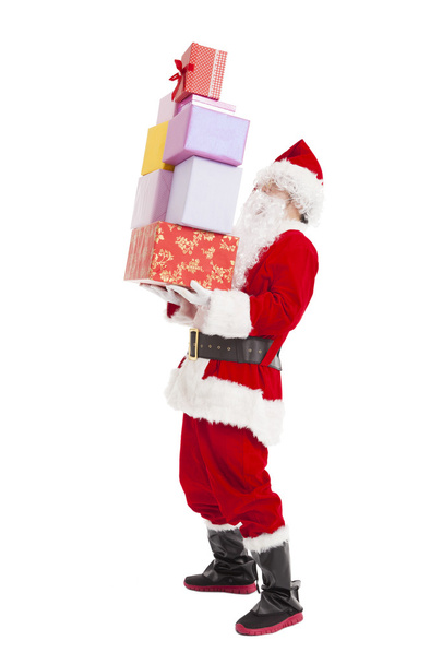 Santa claus houden veel doos van de gift - Foto, afbeelding