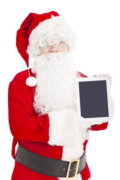 Санта Клаус показує планшетний ПК
 - Фото, зображення