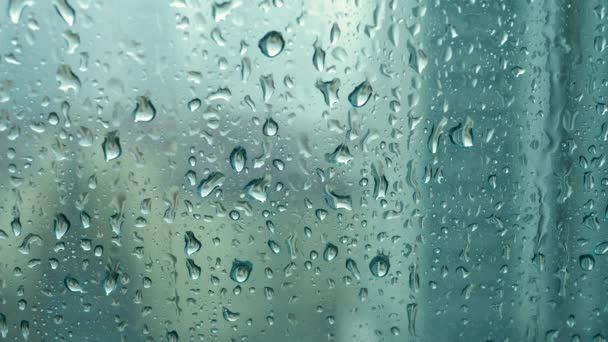 Gota de lluvia en ventana de vidrio - Imágenes, Vídeo