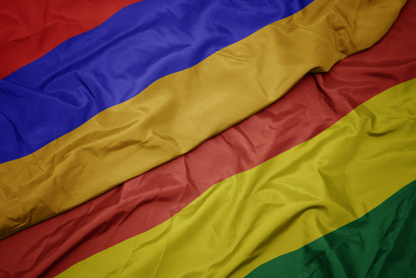 waving colorful flag of bolivia and national flag of armenia. macro - Photo, Image