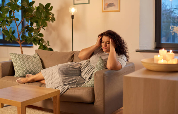 woman suffering from headache at home - Valokuva, kuva
