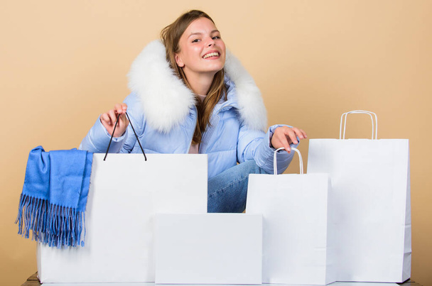 Thanks for your purchase. girl shopping bags. christmas shopping sales. fun and gifts. black friday. happy new year. xmas presents. winter holidays and vacation. woman in down jacket - 写真・画像