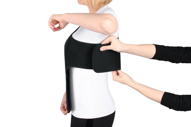 Shoulder Joint Brace. Bandage on the shoulder joint (scarf) with additional fixation. Deso's Handwrap. Supports & Immobilizers. Orthopedic medical Braces. Shoulder injury. - Foto, Imagem