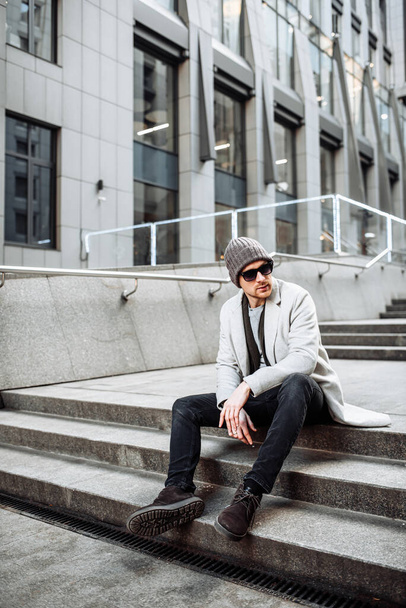 Stylish guy in casual outerwear on the street - Fotoğraf, Görsel