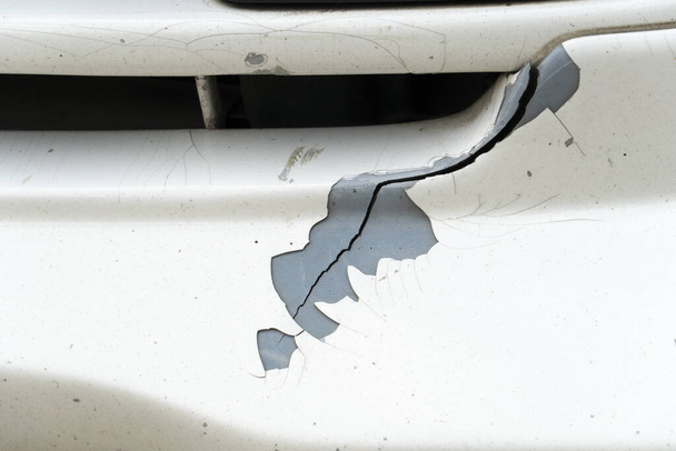 Cracks on cars due to impact or bump. - Photo, Image