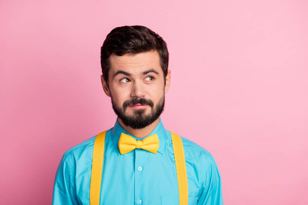 Close-up portrait of his he nice attractive curious bewildered bearded guy wearing festal mint blue shirt creating new idea gift present surprise solution isolated over pastel pink color background - Fotoğraf, Görsel