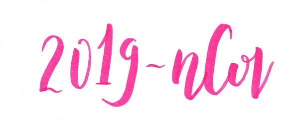Pink inscription 2019-nCov isolated on white. Handwritten lettering - Photo, Image
