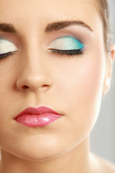 Woman eye with exotic style makeup - Fotó, kép