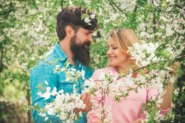 Happy easter. Intimate moments for happy lovers. Sensual couple enjoying intimacy. Young happy couple in love outdoors. Spring portrait of beautiful happy couple. - Photo, image