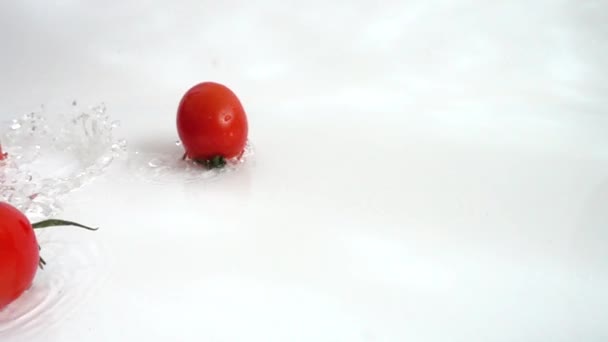 Washing of cherry tomatoes. Slow motion. - Video