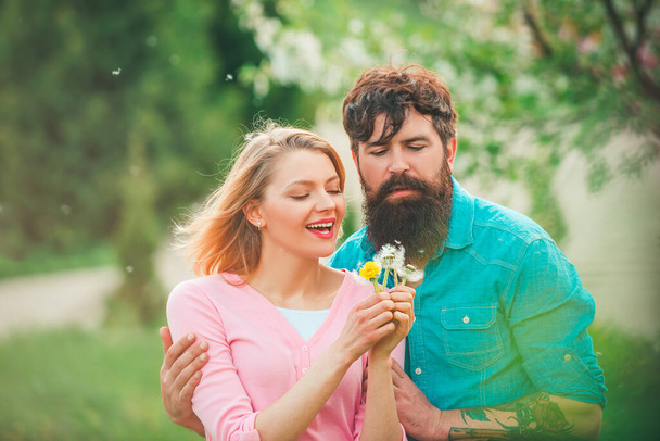 Happy easter couple. Spring couple laughing and hugging. Happy couple in love outdoors. Romantic date couple concept. - Foto, immagini