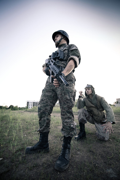 terrorista fogása egy katona, mint egy túsz - Fotó, kép