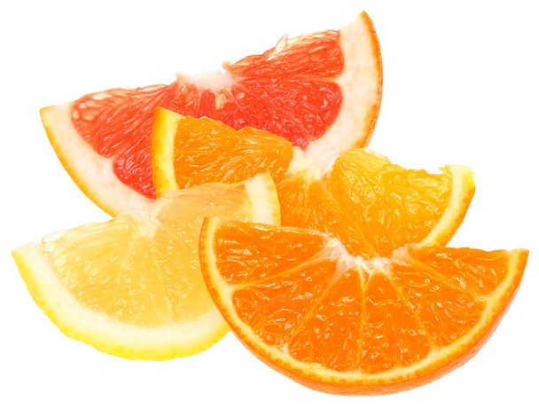 Orange, lemon, grapefruit and tangerine slices. - Foto, Imagem