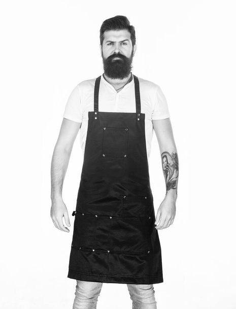 Waiter or bartender. Ready serve drink. Bearded hipster wear apron. Man cook brutal hipster. Fast food restaurant. Serious bearded cook. Restaurant staff. Hipster professional barista apron uniform - Foto, immagini