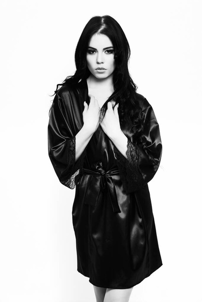sexy girl posing in black silk robe isolated on white - Φωτογραφία, εικόνα