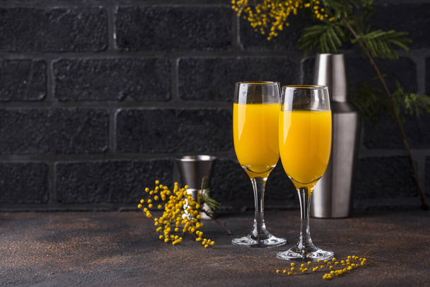 Mimosa cocktail with orange juice - Photo, Image
