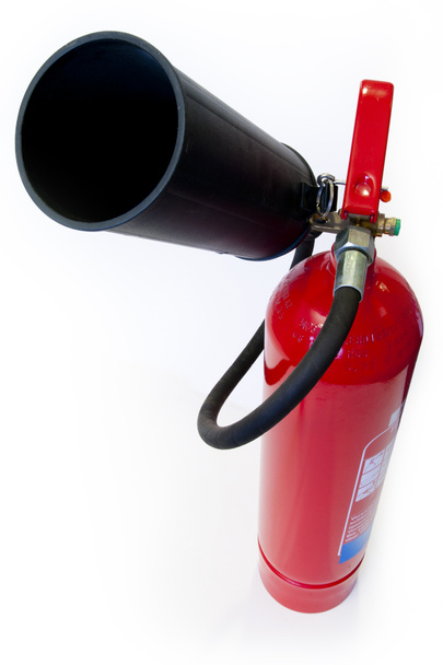 Red extinguisher with black nozzle to extinguish a fire in a building - Photo, Image