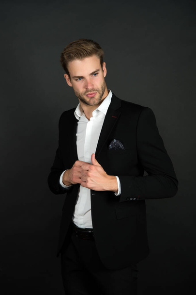 Formal wear for daily work. Bachelor in formal style. Handsome lawyer dark background. Dressing up for business meeting. Formal event. Dress code. Office attire. Fashion and style. Classy and formal - Fotoğraf, Görsel