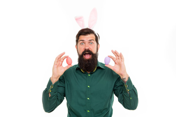 Easter Egg surprise. Surprised hipster hold eggs. Bearded man open mouth with surprise. Springtime. Holiday celebration. It s bunny surprise. Happy Easter surprise - Foto, immagini